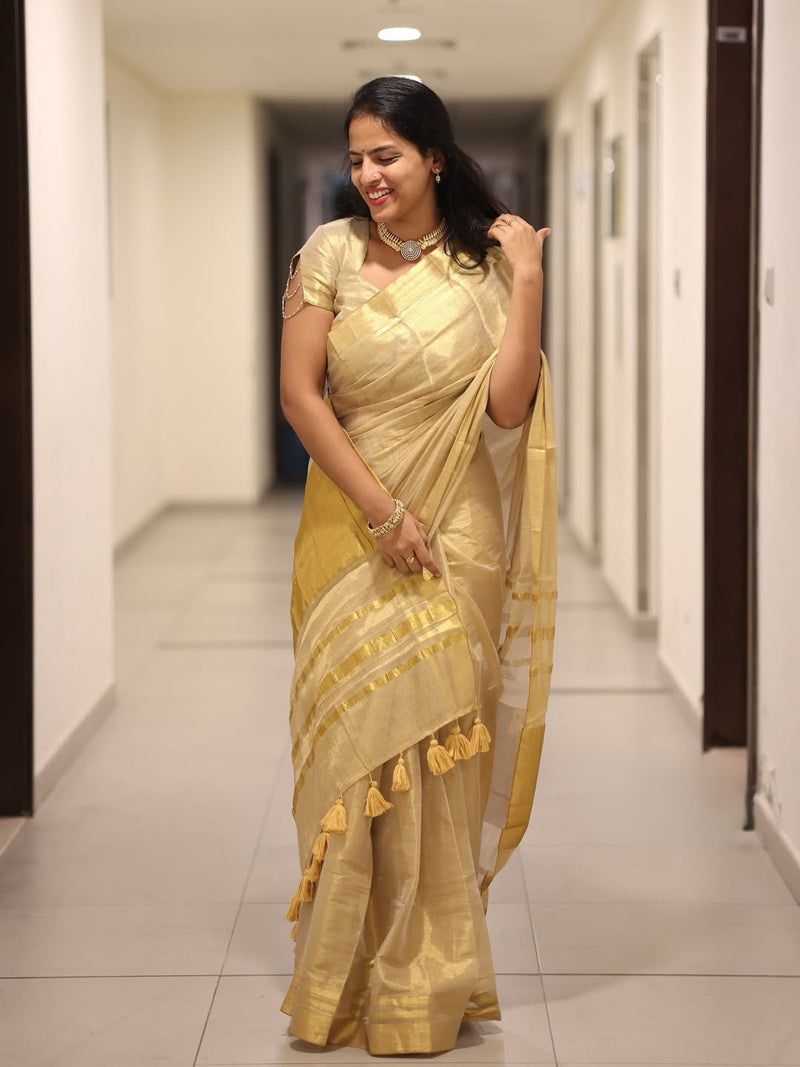 Luxury Off White Gold Kasavu Saree with Designer Tassel Pallu